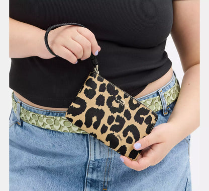 Coach Muñequera animal print